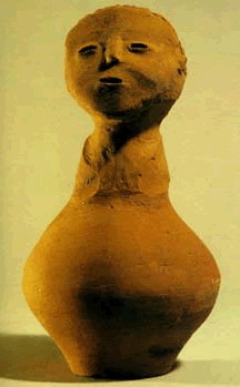 photo of Thin-necked jar sculptured with the shape of human head on the top