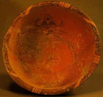 photo of Basin painted with the design of human face and fish