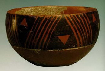 photo of Earthen bowl painted with the design of slanting parallel and triangle