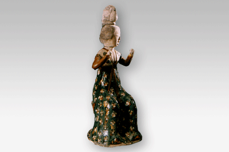 Tri-Colored Pottery Dressing and Making-Up Woman (Tang Dynasty)